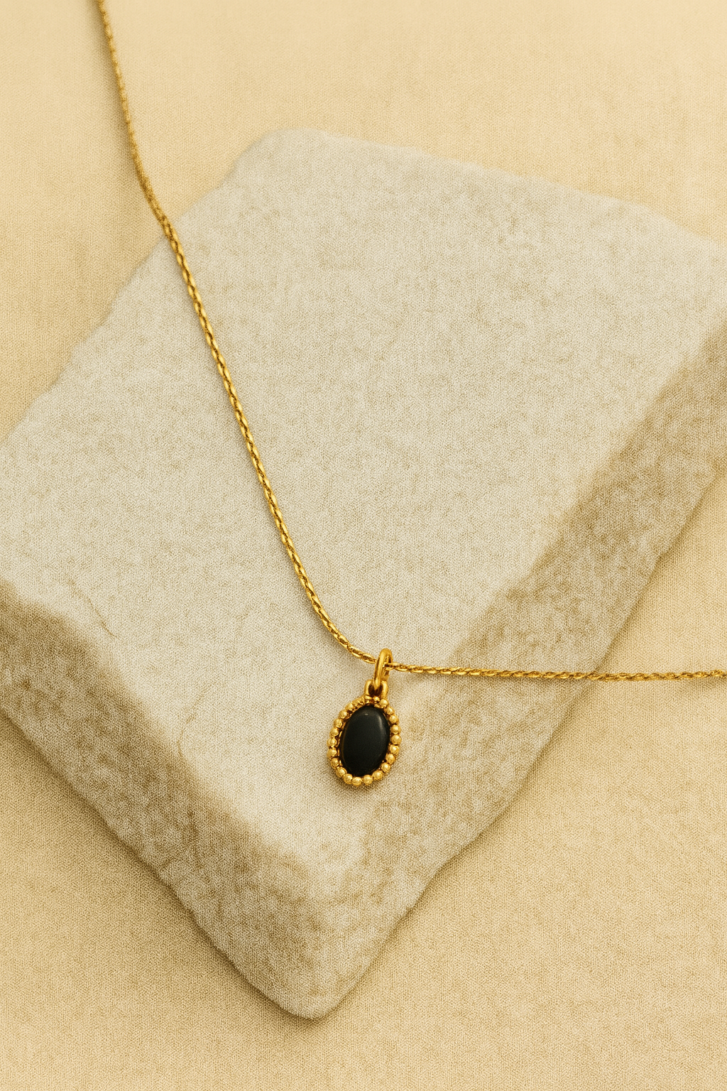 Black Oval Stone Pendant Necklace – Gold Beaded Halo LN10190