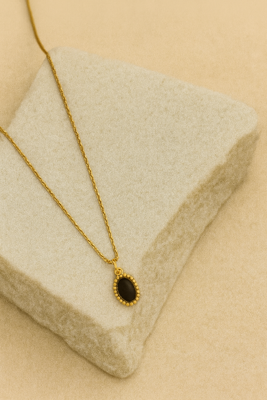 Black Oval Stone Pendant Necklace – Gold Beaded Halo LN10190