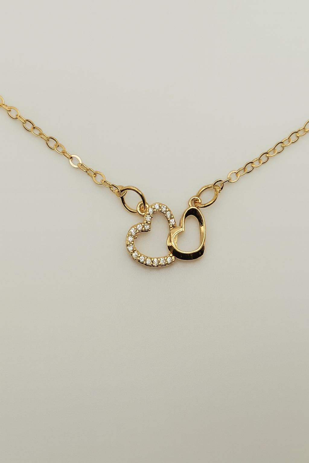 Dual Heart Gold Necklace – Dainty Crystal & Solid Heart Pendant for Women LN10321
