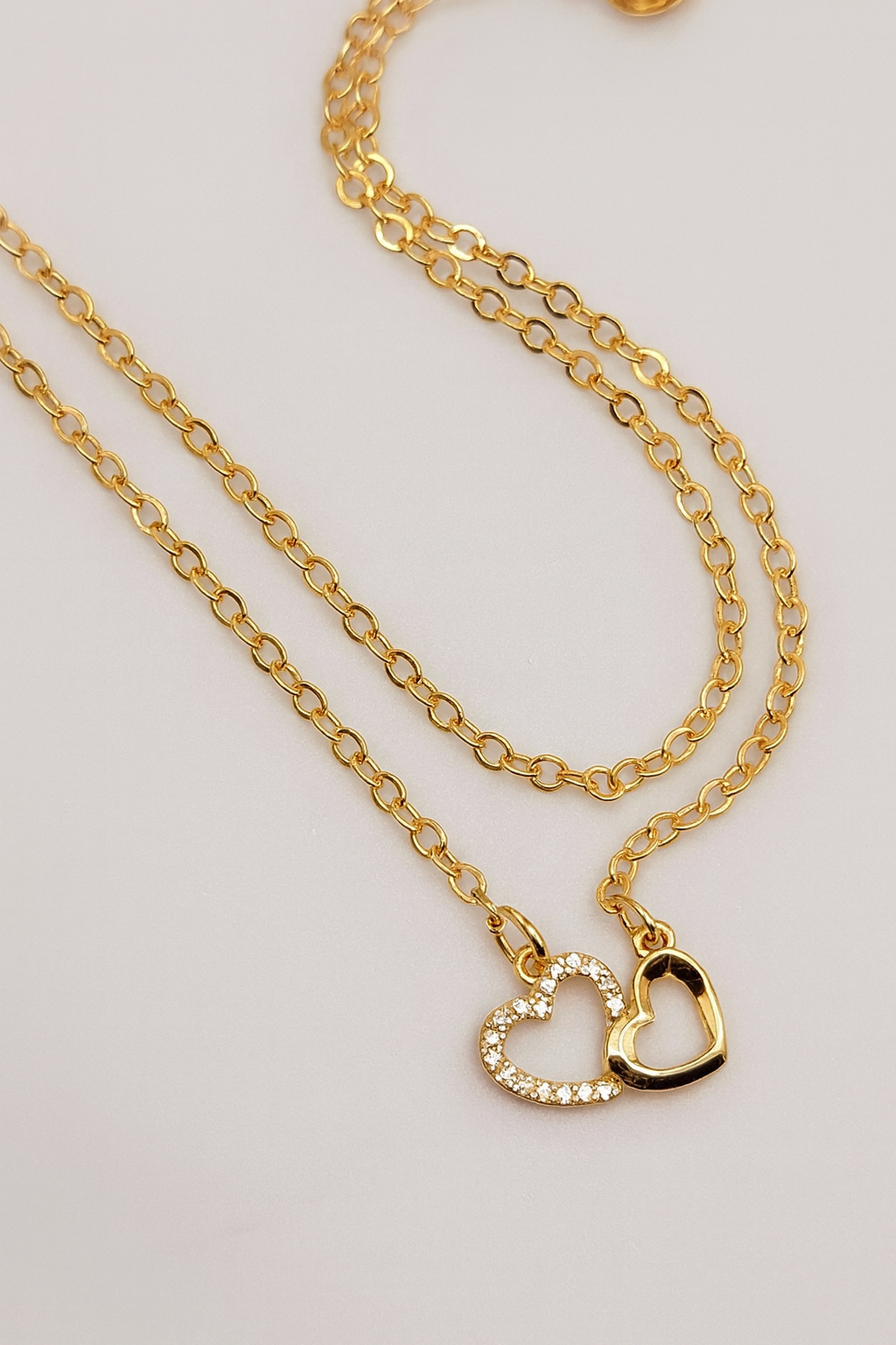 Dual Heart Gold Necklace – Dainty Crystal & Solid Heart Pendant for Women LN10321