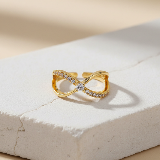 Infinity Gold Ring – Adjustable Crystal-Studded Symbol of Endless Elegance LR10185
