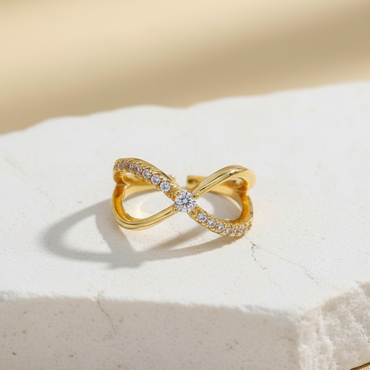 Infinity Gold Ring – Adjustable Crystal-Studded Symbol of Endless Elegance LR10185