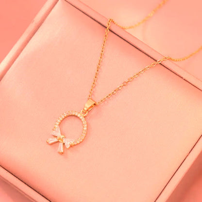 Rose Gold Bow Circle Pendant Necklace – Dainty Sparkling Chain LN10175