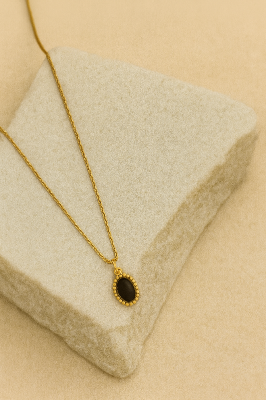 Black Oval Stone Pendant Necklace – Gold Beaded Halo LN10190