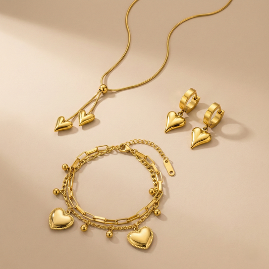 Gold Heart Jewellery Combo Set – Double Heart Necklace, Heart Drop Earrings & Layered Charm Bracelet for Women LCS10119