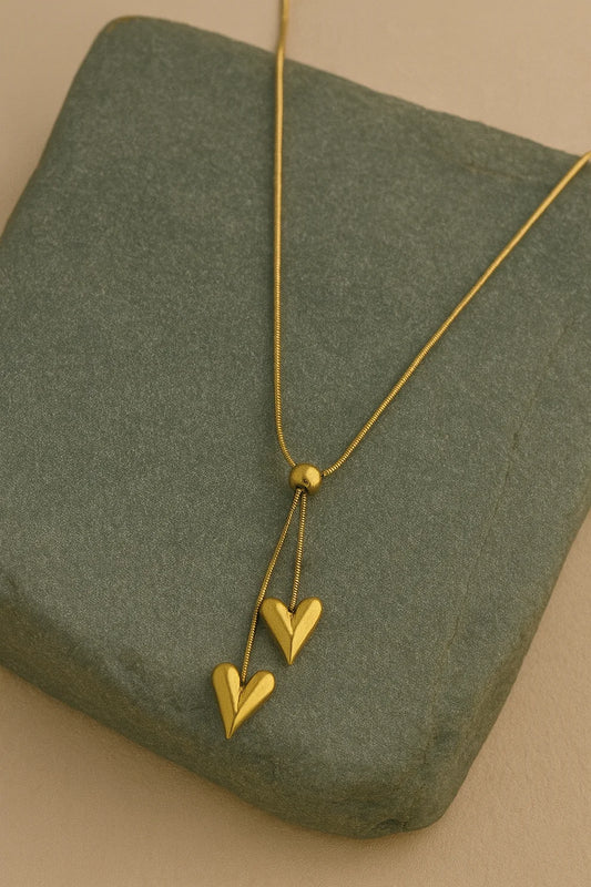 Gold Heart Jewellery Combo Set – Double Heart Necklace, Heart Drop Earrings & Layered Charm Bracelet for Women LCS10119