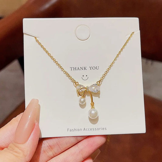Gold Bow Pearl Drop Necklace Elegant Minimalist Pendant LN10171