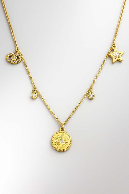 Gold Celestial Charm Necklace – Sun, Star & Evil Eye Pendant with Cubic Zirconia Accents LN10155