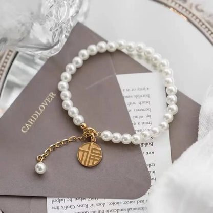 Gold Pearl Beaded Bracelet with Coin Charm – Elegant Adjustable LB10104