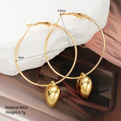 Gold Plated Heart Hoop Earrings – Chic Romantic Statement Jewelry LE10350