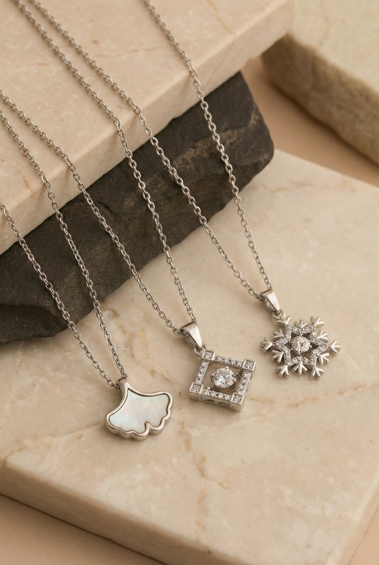 Premium Silver Pendant Necklace Combo Set for Women – Ginkgo Leaf, Square Halo & Snowflake Crystal Design ( Set of 3 ) LCS10110